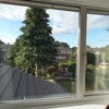 Photo 4: lovely view across the garden to fields beyond