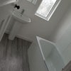 Photo 2: Bathroom: Washing machine, tumble drier, bath, new shower, toilet. There is a second toilet downstai