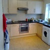 Photo 6: kitchen and living rom