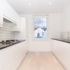Photo 4: The kitchen