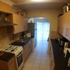 Photo 9: Kitchen and dining area