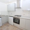 Photo 2: Kitchen with Modern Appliances