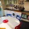 Photo 3: Kitchen - two large fridge freezers and further storage not shown in photo