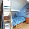 Photo 2: Attic bedroom
