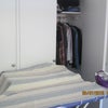 Photo 3: Built In Wardrobes, Brabantia Ironing Board, Tefal Iron.