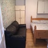 Photo 4: Sofa, wardrobe and bed