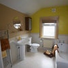 Photo 4: The bath/shower room