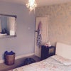 Photo 2: Bed opposite wardrobes