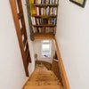 Photo 7: Staircase with bespoke Bookcase & Ladder