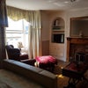 Photo 8: Massive room, double bed, 4 seater sofa, large armchair, fireplace, big footstool.