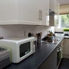 Photo 6: Second kitchen - ideal for a quick bite!