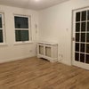 Photo 5: Lounge showing entrance to kitchen on the right side