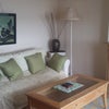 Photo 7: Quiet sitting room with T V