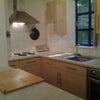 Photo 4: Kitchen area looking out to your patio