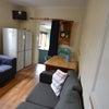 Photo 2: comfy communal room with TV