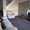 Photo 4: Lounge with Leather Sofa's, 32" Flat Screen TV, SKY TV Channels & Unlimited Wireless Broadband