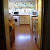Photo 4: Kitchen - Dishwasher and washing machine