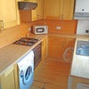 Photo 3: Rear facing fitted kitchen