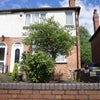 Photo 1: Front of house