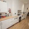 Photo 3: lots of cupboard space and well equipped 