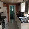 Photo 4: lovely galley kitchen