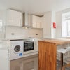 Photo 2: Open plan kitchen, dining, lounge