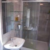 Photo 9: Luxury walk in shower in Bathroom 1 with sink and toilet