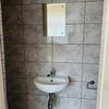 Photo 4: Power shower toilet and sink