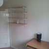 Photo 2: There are shelves on the wall both sides to save floor space