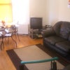 Photo 1: Shared Living Room Area