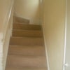 Photo 3: Stairs lead up from front door