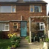 Photo 8: Sunny private enclosed front garden. Solar panels on roof.