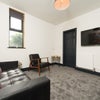 Photo 9: HMO living room