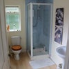 Photo 4: Upstairs toilet and shower