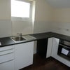 Photo 9: shared kitchen with washing machine and hob