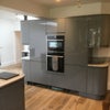 Photo 8: The brand new kitchen has all built in equipment incl two ovens Fridge and seperate freezer