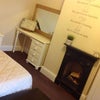 Photo 2: Desk and Original Feature Fireplace