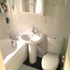 Photo 4: Bathroom with shower and bath.