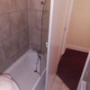 Photo 7: Shared bathroom with bath 