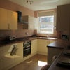 Photo 2: Kitchen with integrated appliances and American fridge freezer