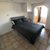 Photo 2: bedroom with archway to dressing room 