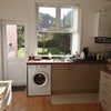 Photo 2: Shared kitchen and dining area