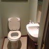 Photo 5: Adjoining clock room toilet 