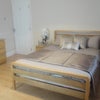 Photo 2: Large bright room with high ceiling, double bed, tall wardrobe, desk & chair