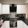Photo 4: Modern well equipped kitchen