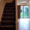 Photo 3: Stairs and view through to garden