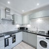 Photo 3: Kitchen communal area