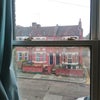 Photo 3: Outside view of the room.