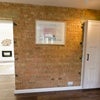 Photo 3: brick wall of kitchen