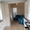Photo 4: Beautiful breakfast bar leading to open plan living room and separate dining room